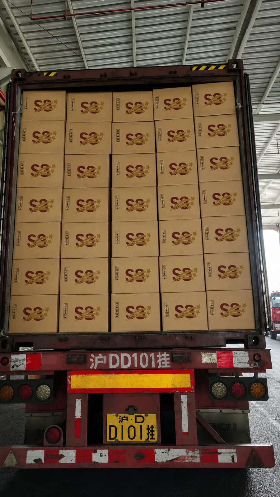 A full container load of S3-branded inverter cartons, stacked wall to wall